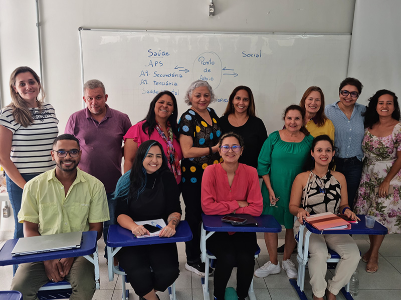 Professors for the professional development course, in a classroom.